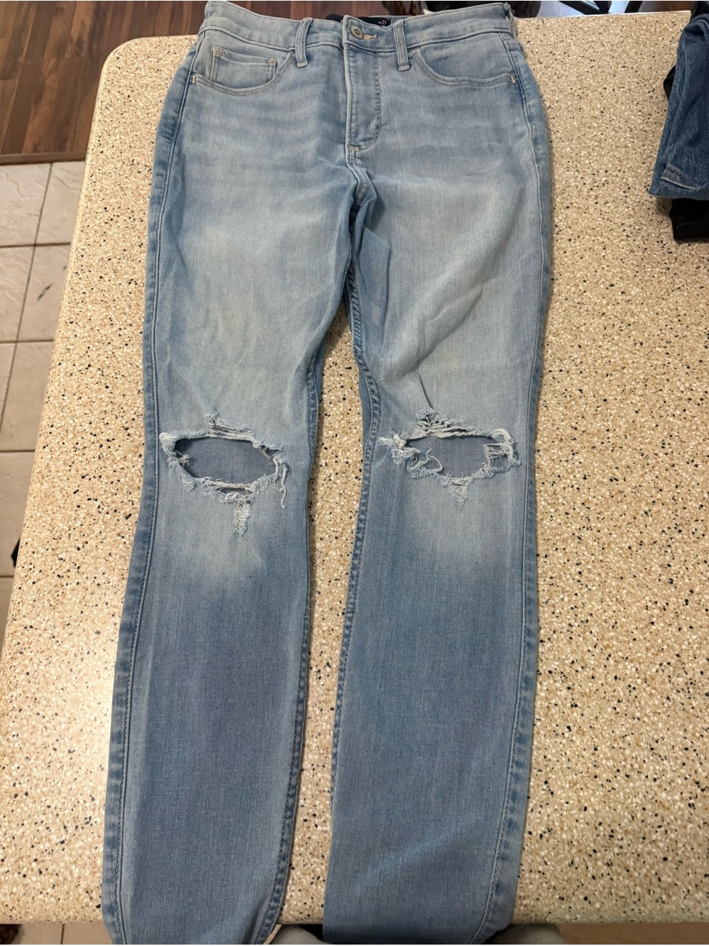 Hollister Light Wash Curvy high rise super skinny Ripped Knee Jeans